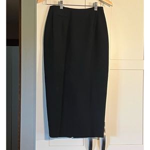 Dana Buchman black wool lined pencil skirt, slit up back, size 4